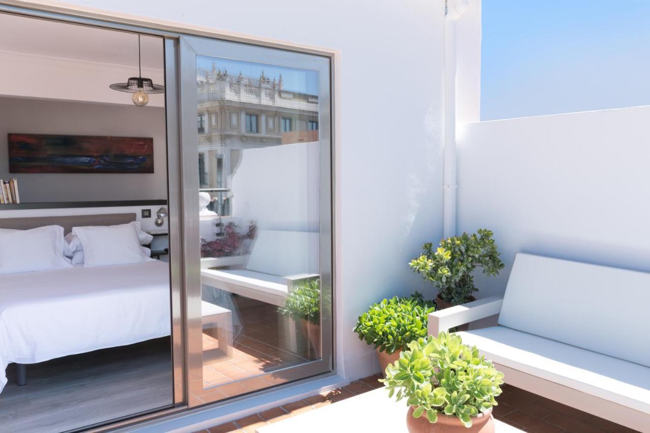 Puerta Catedral Holiday Suites Sevilla Exterior foto