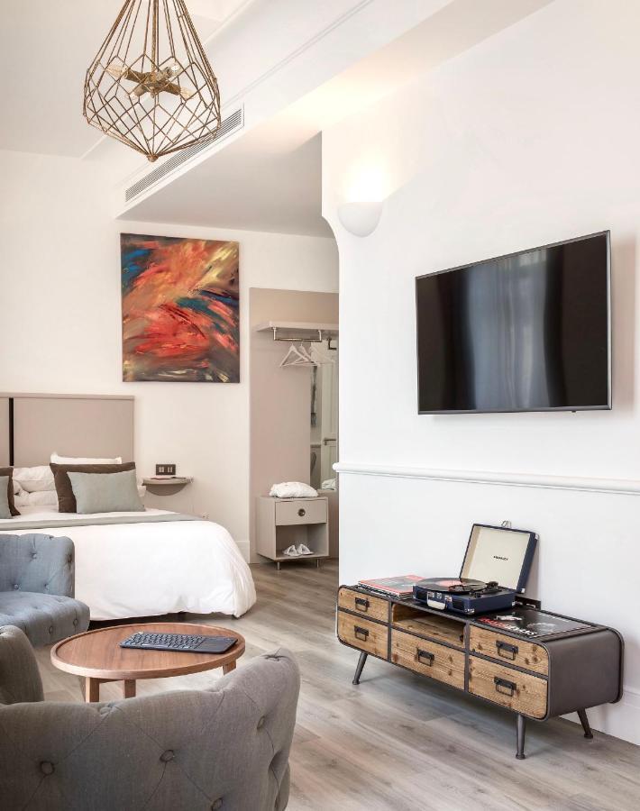 Puerta Catedral Holiday Suites Sevilla Exterior foto